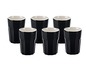 Sechs schwarze Espressotassen.