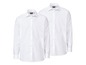 Zwei weiße Hemden mit langen Ärmeln.