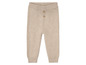Beige gestrickte Hose für Babys