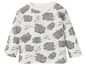 Weißes Langarmshirt für Babys mit grauem Nashorn-Druck und dem Text 'be a little wild'.