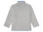 Grauer Langarm-Pullover mit blauem Futter.