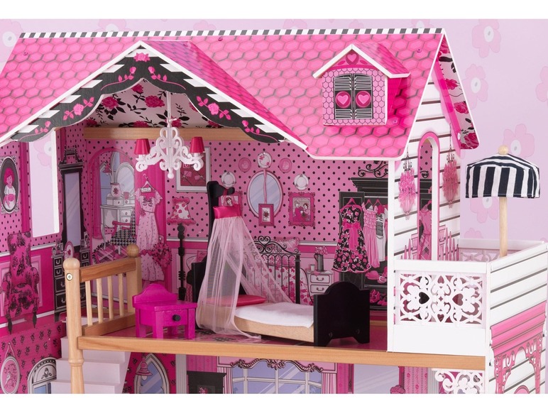 Ein rosa Holzpuppenhaus mit Balkon und Schlafzimmer.
