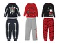 Drei Kinderpyjama-Sets mit Skelett-, Fledermaus- und Vampirmotiven.
