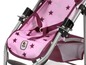 Ein rosa Chicco Puppenwagen mit Sternmuster.