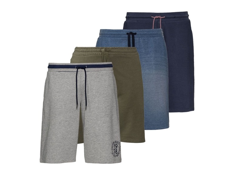 Vier Paar Shorts, darunter ein graues Paar mit 'Custom Built 1983' Logo.