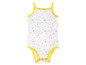 Weißer Babybody mit gelbem Rand und Punkte-Muster.
