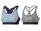 Zwei Sport-BHs, ein blauer von Esmara und ein grauer mit schwarzen Punkten.
