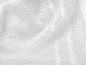Weiches, weißes Handtuch mit Textur.