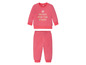 Rosa Baby Jogginganzug mit dem Aufdruck 'Reach for the stars'.