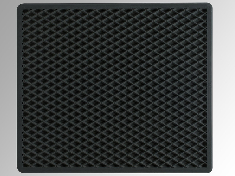 Eine schwarze Gummimatte mit einem Rautenmuster.