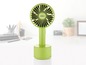 Ein grüner, tragbarer Ventilator von UNOLD.