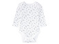 Weißer Babybody mit schwarzen Punkten.