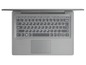 Ein silberner Laptop mit Tastatur und Touchpad