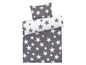 Bettwäsche in Grau mit weißen Sternen.