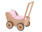 Ein hölzerner Puppenwagen mit einem rosa Kissen.