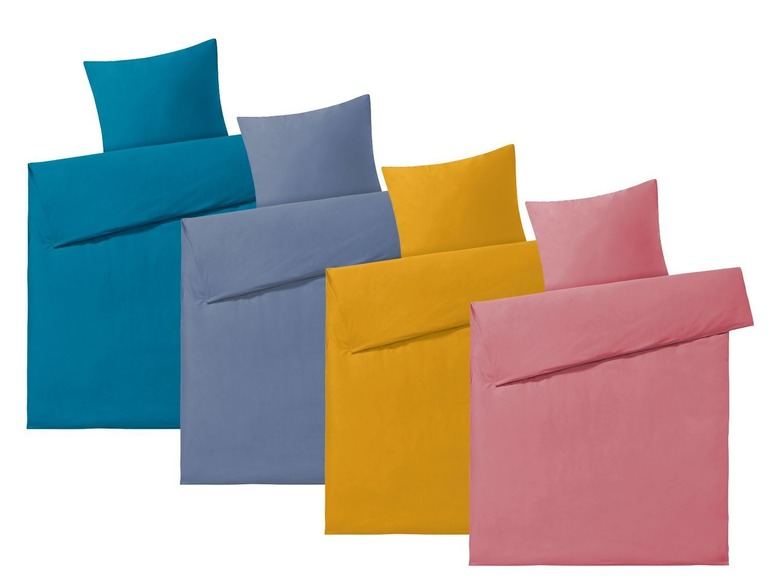 Vier Bettbezüge in verschiedenen Farben: Türkis, Grau, Gelb und Rosa.
