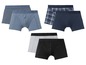 Sechs Boxershorts, darunter zwei mit Karomuster.