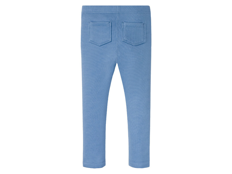 Blaue Skinny Jeans mit Gesäßtaschen.