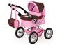 Ein rosa Kinderwagen mit braunem Verdeck und passender Tasche.