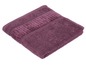 Ein dunkelviolettes Frottee-Handtuch.