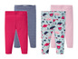 Vier Leggings für Babys: rosa, gestreift, rosa mit Dinosauriern und rosa mit Blumen.