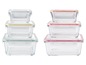 Zwei Sätze gläserner Aufbewahrungsbehälter mit farbigen Deckeln