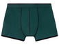 Ein Paar dunkelgrüne Boxershorts.