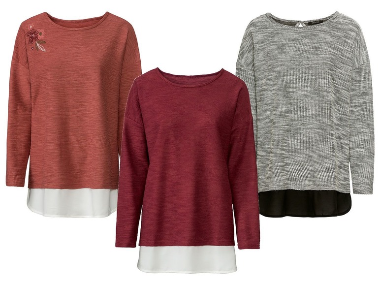 Drei Damenpullover mit langen Ärmeln in verschiedenen Farben.