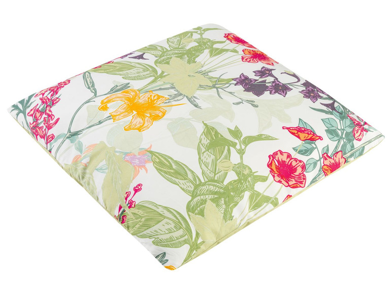 Kissen mit Blumenmuster in Gelb-, Rosa- und Grüntönen.