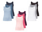 Sieben basic Tanktops in verschiedenen Farben.