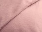 Weicher rosa Stoff, gefaltet, um die Textur zu zeigen.