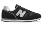 Schwarze New Balance Sneaker mit grauem Detail.