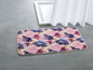Badematte mit rosa und blauen Blumenmuster