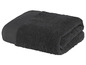 Ein dunkelgraues Handtuch aus Frottee.