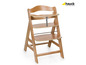 Ein Hauck Kinderstuhl aus Holz mit Tischplatte.