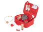 Eine rote Spielzeug-Arzt-Tasche mit Stethoskop, Thermometer, Hammer und anderem Zubehör.