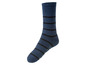 Blaue Socken mit schwarzen Streifen und rutschfesten Punkten.