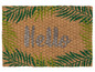Willkommenmatte mit Palmenblättern und dem Schriftzug 'Hello'.