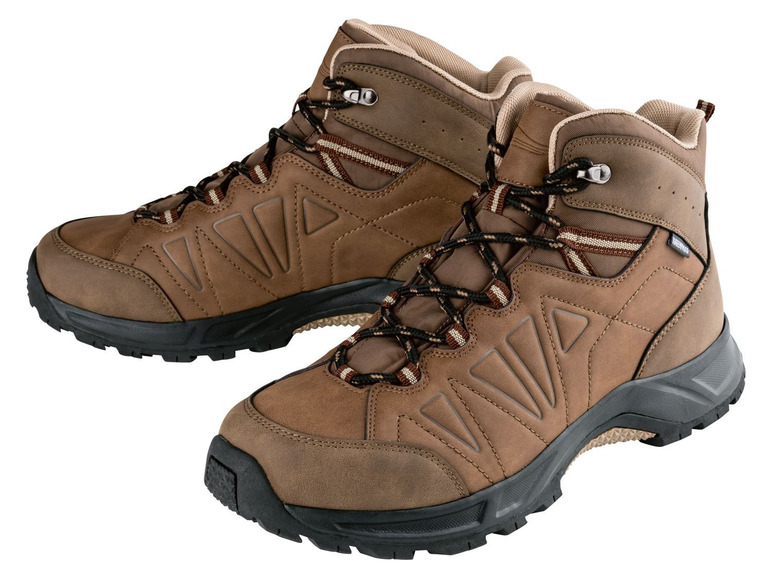 Zwei Paar braune Wanderschuhe mit Schnürsenkeln.