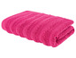 Ein rosa Handtuch mit Streifen.