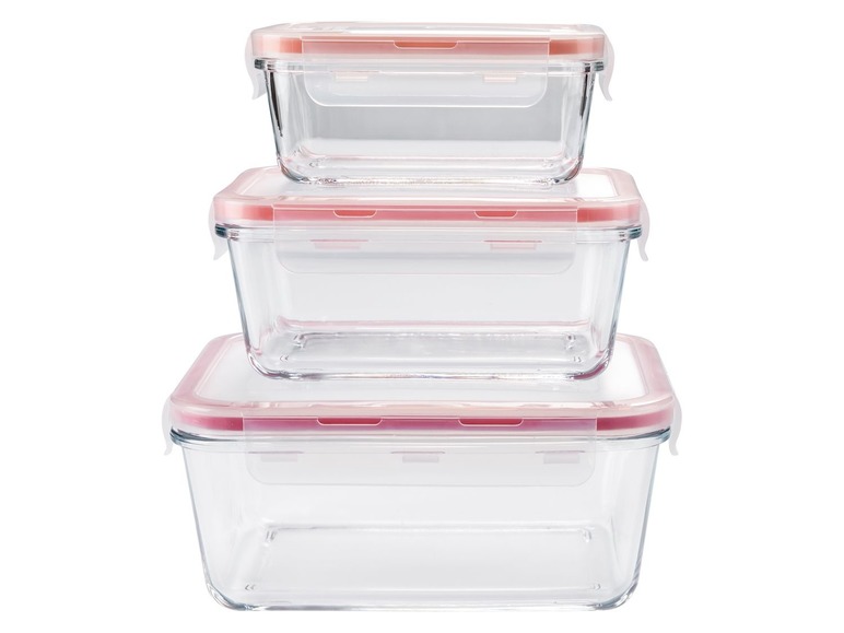 Drei Glasbehälter mit rosafarbenen Deckeln.
