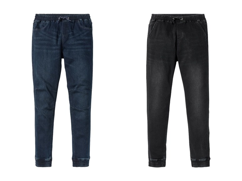 Zwei Paar Jeans, eine dunkelblaue und eine schwarze.