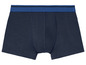 Dunkelblaue Boxershorts mit einem blauen elastischen Bund
