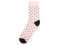 Eine rosa Socke mit schwarzen Punkten.