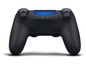 Ein schwarzer PlayStation 4 Controller mit blauem Lichtbalken.