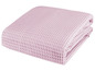 Eine rosa, gefaltete Waffeldecke.