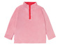 Rosa Fleecejacke mit roten Knöpfen.