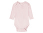 Ein rosa Baby-Body mit langen Ärmeln.