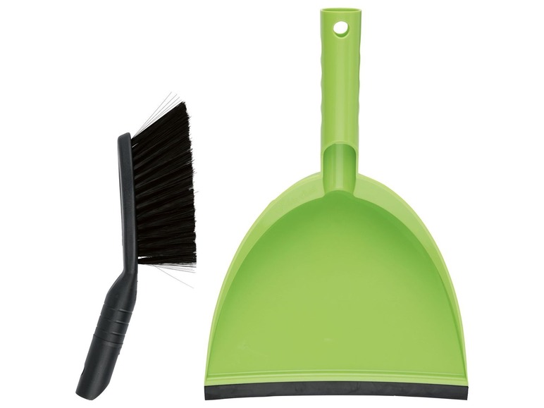 Ein grüner Besen mit einer schwarzen Bürste.