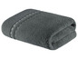 Ein gefaltetes, dunkelgraues Handtuch mit einem gestreiften grauen Rand.